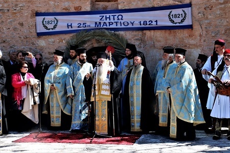 Priests seen outside the abbey of St. Lavra during the representation.
Thousands of pilgrims went to the abbey of St. Lavra in Kalavryta, to the starting ground of the Greek revolution of 1821 to witness the representation of the oath taking of the Greek fighters. The event took place on the Independence Day.