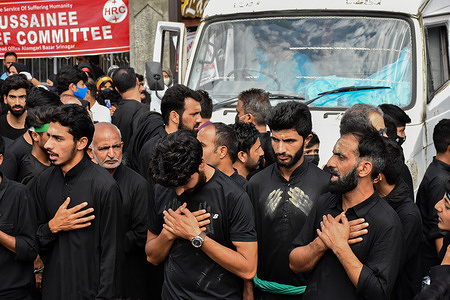 Kashmiri Shiite Muslims take part in a ritual religious procession during the month of Muharram to mark Ashura.
Ashura is the tenth day of Muharram, the first month of the Islamic calendar, observed around the world in remembrance of the martyrdom of Imam Hussain, the grandson of Prophet Muhammad (PBUH).