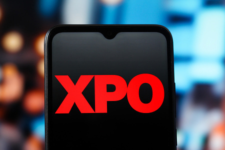 In this photo illustration, the XPO logo is seen displayed on a smartphone screen.