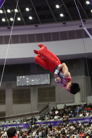 Pua Asher of Singapore competes on the rings during the Men's Gymnastics Team Final at the 20th Asian Games in Aichi-Nagoya.