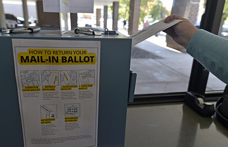 A woman drops her mail-in ballot into the drop box at the Luzerne County Board of Elections.
Voting has started in Pennsylvania and daily voters are lining up to return Mail-in ballots in Luzerne County.