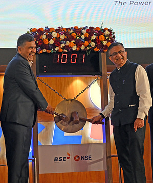 L-R Srinivas Injeti Chairperson, National Stock Exchange (NSE) and Ashishkumar Chauhan, Managing Director (MD) and Chief Executive Officer (CEO) of the National Stock Exchange (NSE) pose for a photo holding a gong near the bell during the listing ceremony of National Stock Exchange (NSE) at Bombay Stock Exchange (BSE) in Mumbai. National Stock Exchange (NSE) India Limited shares were listed today on 24th September 2026 at the Bombay Stock Exchange (BSE) opening at Rs.1,800 (18.75 USD) and closed at Rs.1,817 (18.93 USD) on its debut.