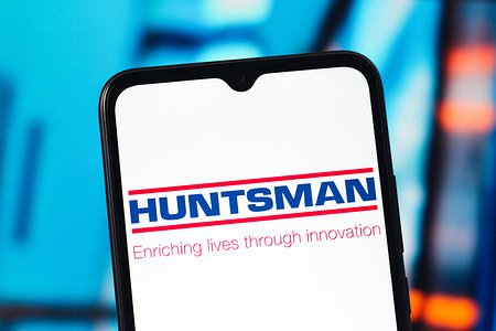 In this photo illustration, the Huntsman Corporation logo is seen displayed on a smartphone screen.