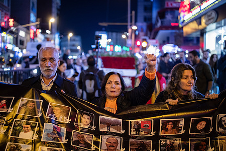 Demonstrators march while carrying a banner during the rally. People in Istanbul’s Kadıköy district commemorated the victims of the October 10, 2015, ISIS terrorist bombing at Ankara Train Station, the deadliest attack in modern Turkish history. The bombing targeted a peace rally of pro-Kurdish and labor activists, killing over 100 people. During the commemoration, participants held a banner reading “We will not forget, we will not forgive,” and displayed photographs of those who lost their lives.