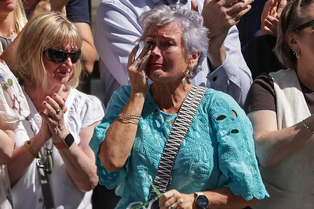 An emotional supporter of outgoing British Prime Minister Sir Keir Starmer, on 10 Downing Street in London.