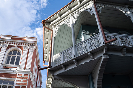 Traditional Georgian style wooden balconies of restored houses in Tbilisi Old Town, Georgia.
