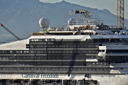 View of the Carnival Freedom docked in the French Mediterranean port. The Carnival Freedom is docked in the French Mediterranean port of Marseille for maintenance and repairs.