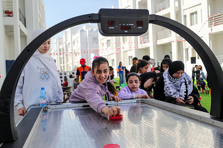 Gazan children who were transferred to Doha for medical treatment due to Israeli attacks on Gaza are seen participating in Qatar's annual National Sports Day games in an open area within the Al Thumama residential complex in Doha, Qatar. National Sports Day is marked annually on the second Tuesday of February and aims to encourage healthy lifestyles, with a range of sports and physical activities held across the country.