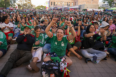 Fans of Mexico react while watching a live broadcast of the FIFA World Cup Round of 32 soccer match between Mexico and Ecuador at a watch party in Los Angeles, on Tuesday, June 30, 2026. Mexico 2 - 0 Ecuador
