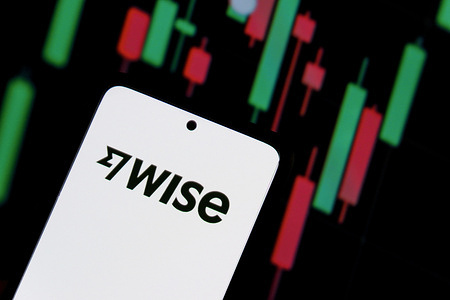 In this photo illustration, the Wise logo is seen displayed on a smartphone screen.