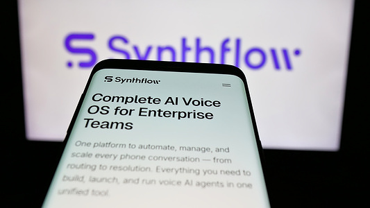 In this photo illustration, a mobile phone with the website of German company AgentFlow AI GmbH (Synthflow) is seen on screen in front of logo.