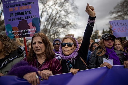 A woman raises her fist during a feminist demonstration in downtown Madrid Demonstration was organized by the 8M Commission on International Women's Day, with the slogan "Friends, we feminists stop fascism."
Once again, the feminist movement in Madrid was divided and marched in two simultaneous demonstrations through the city center.