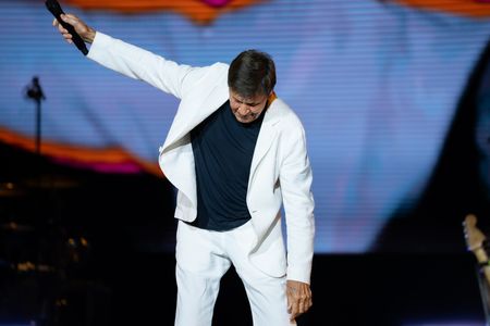 Gianni Morandi performs live at the Arena Flegrea during the C'era un ragazzo Tour 2026.