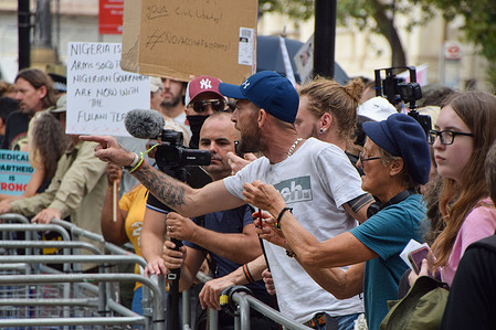 A protester gestures and shouts at police officers during the demonstration outside Downing Street.
Crowds marched through Central London and gathered outside Downing Street in protest against COVID-19 vaccines, vaccinating children and vaccination passports.