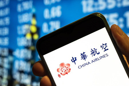 In this photo illustration, the Taiwanese China Airlines logo is displayed on a smartphone screen.