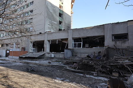 General view of damaged building of the Odesa Professional College of Construction and Architecture on Bazarnaya Street. Early in the morning of January 13, 2026, Odesa was attacked by Russian attack drones. The Russian drones injured six people, and damaged residential building, the Odesa Professional College of Construction and Architecture, and Specialized School No. 90.