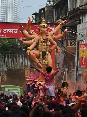 Devotees seen carrying an idol of elephant-headed Hindu god Ganesha for immersion on Anant Chaturdashi. Anant Chaturdashi marks the end of a ten day festival of Ganesh Chaturthi (celebrated as birthday of Ganapati) where devotees immerse the idol of elephant headed Hindu god Ganesha in a free flowing water body amidst chanting of 'come back early next year.