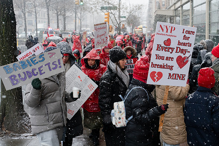 Nurses of NewYork-Presbyterian Columbia University Irving Medical Center picket during a post-Christmas snowstorm on Saturday, 17 January 2026 in in New York, New York, USA. The New York State Nurses Association members walked off their jobs at Mount Sinai, NewYork Presbyterian, and Montefiore hospitals over unsafe working conditions, citing overwhelming patient loads that prevent them from delivering adequate care.