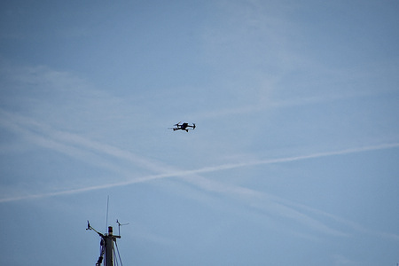 A drone is seen flying over the Old Port of Marseille.