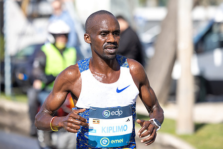 Jakob Kiplimo seen in action during the EDP Meia Maratona de Lisboa 2026 (EDP lisbon half marathon 2026). New world record. Time: 00:57:20 Men’s podium:
1- Jakob Kiplimo - 00:57:20 (WR)
2- Nicholas Kipkorir - 00:58:08
3- Gilbert Kupkosgei Kiprotich - 00:58:59

Women’s podium:
1- Tsigie Gebreselama - 01:04:48
2- Janeth Chepngetich - 01:06:50
3- Regina Wambui - 01:07:10