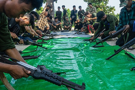 PDF fighters from Battalion 12 in Shwebo District conduct a weapons training. The People’s Defense Force (PDF) operates under the command of the National Unity Government (NUG), a rival administration that is resisting the military junta.
