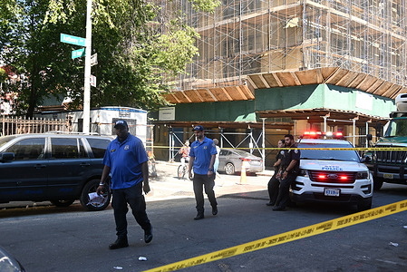 Officials with the New York City Police Department stage at the scene where a man was fatally shot in the back in broad daylight in the area of East 176 Street and Anthony Avenue within the confines of the 46 Precinct in Bronx, New York, United States. Tuesday morning around 8:00 AM, the shooting transpired. The victim was transported by EMS to the hospital where he was pronounced dead. There are no arrests and the investigation is ongoing by the New York City Police Department.