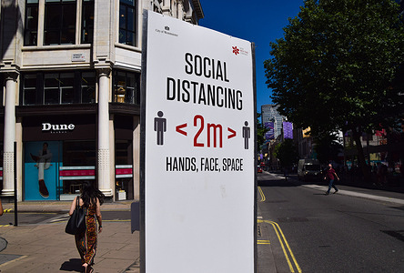 A social distancing sign seen on Oxford Street in London, as COVID-19 infections continue to rise in the UK.