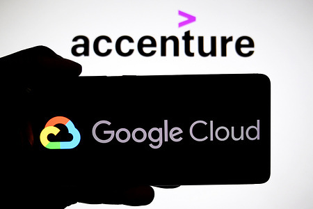 In this photo illustration, a Google Cloud logo is seen displayed on a smartphone with an Accenture logo in the background.