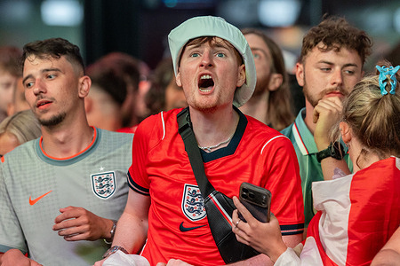 An England fan watches the live public screening of the 2026 FIFA World Cup quarter-final match between Norway and England on the big screen at BOXPARK Croydon. Final scores, England 2-1 Norway.