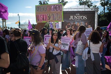 A student is seen holding a placard against gender violence during a feminist students strike. The main students union celebrated the International Women's Day with a general strike, hundreds of students demonstrated against violence against women. Women's organizations came back to the streets with a student protest ahead 8th march.