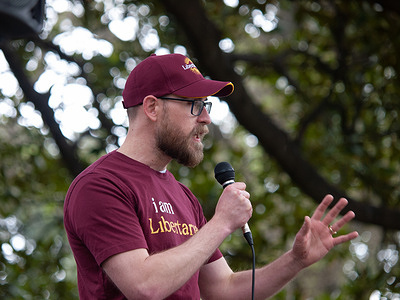 Libertarian Party federal Senate candidate for Eastern Victoria Jordan Dittloff, speaks during the rally. The Australian Libertarian Party held a public rally at Flagstaff Gardens espousing party policy; particularly opposition to the federal government's proposed Communications Legislation Amendment (Combatting Misinformation and Disinformation) Bill 2024, and the state of Victoria's proposed changes to anti-vilification laws.