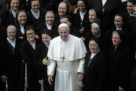 Pope Francis with the nuns as he leaves at the end of the weekly General Audience in Paul VI Hall.