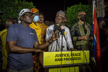 Ousainou Darboe, opposition leader and presidential candidate for the United Democratic Party (UDP), speaking to supporters outside his home.
Ousainou Darboe rejects the results of the Gambia's first presidential election since the ousting of Yahya Jammeh, which saw incumbent Adama Barrow returned to power.
