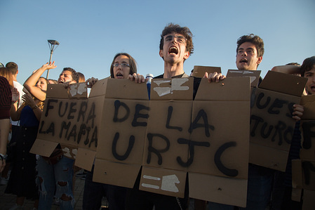 Students seen shouting against corruption with in the university with posters during a strike by students of the Rey Juan Carlos University. They were protesting the loss of prestige the university has experienced in recent times as a result of the scandals relating to the award of masters degrees that have affected the leader of the PP, Pablo Casado, and that have caused the resignation of a minister, Carmen Montón and the president of Madrid Cristina Cifuentes.