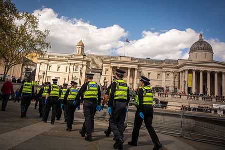 The Metropolitan Police march to the crowd of peaceful protestors to arrest them during the Lift The Ban on Palestine Action Protest in London's Trafalgar Square. Defend Our Juries and partner organisations called on everyone to join together holding the same signs as before. It’s Everyone Day in Trafalgar Square. The courts must Lift The Ban on Palestine Action, and drop all charges and investigations into the almost 3,000 people who have been arrested under the Terrorism Act for allegedly supporting the group since the proscription came into effect. The UK Government must end its complicity in Israel’s genocide.