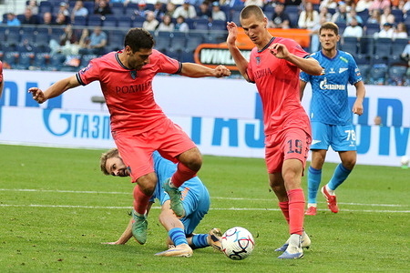 Maksim Glushenkov (10) of Zenit, Leo Goglichidze (3) and Dmitriy Tananeev (19) of Rodina seen in action during the Russian Premier League football match between Zenit Saint Petersburg and Rodina Moscow at Gazprom Arena. Final score; Zenit 1:2 Rodina.