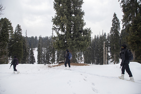 Indian Border Security Force personnel patrol through snow covered terrain in the hill station and ski resort of Gulmarg. Security has been placed on high alert across Indian-administered Kashmir as authorities intensified operations in border areas and snow-covered high-altitude terrain in the Himalayas amid harsh winter conditions, citing concerns over possible militant infiltration and activity.