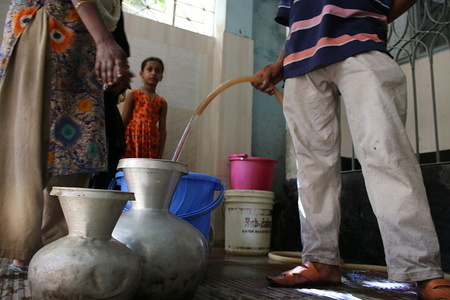 Residents seen filling up pots with water during the crisis.
For these residents, the scorching days of summer are made worse by the abject lack of water in some local areas of Dhaka. Between the sweltering summer heat and the long hours of fasting for Ramadan, residents of these areas are on the verge of launching a protest as there has been no water supply in the area for nearly three weeks.