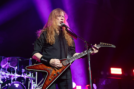 Dave Mustaine of Megadeth seen performing live on stage. Megadeth played London's O2 Arena as Special guests of the Band Disturbed on their 25th Anniversary tour Sick Things. Megadeth consists of Dave Mustaine (vocals, guitars), Teemu Mäntysaari (guitars), James LoMenzo (bass), and Dirk Verbeuren (drums)