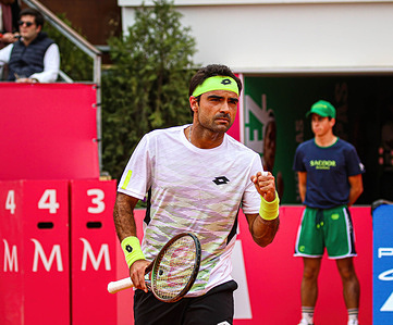 Frederico Ferreira Silva of Portugal, plays against Damir Dzumhur of Bosnia, during the qualifying of the Millennium Estoril Open tournament at CTE- Clube de Ténis do Estoril.