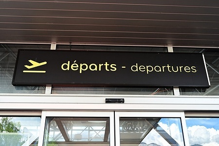 Flight departure board at Chambery airport in the Savoie department of France.
