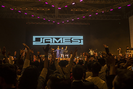 Singer-songwriter, Faruq Mahfuz Anam commonly known as James performs on stage at the Hope Festival at Army Stadium in Dhaka.