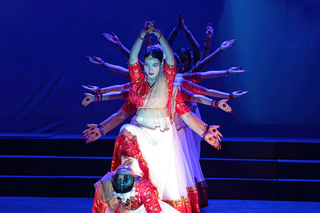 Artists perform a traditional dance drama based on the Story of Goddess Durga at the National Cultural Cooperation during the Dashain festival. Dashain festival is the greatest and longest festival of Nepalese people as it marks the victory of the goddess Durga over the demon Mahishasura. Dashain is dedicated to the goddess Durga, who is seen as a symbol of power and divine energy. Devotees offer prayers and sacrifices to the goddess during this time.