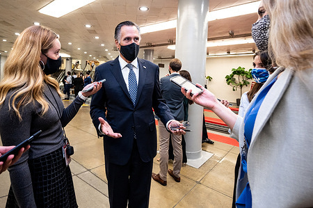 U.S. Senator Mitt Romney (R-UT) speaks to reporters near the Senate Subway.