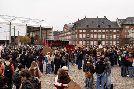 Protesters are seen during a demonstration. Students in Copenhagen protested on November 11 against government plans to raise grade requirements for Student Exchange (STX) and Higher Commercial Examination (HHX), cut STX budgets, eliminate 10th grade, and abolish Higher Preparatory Examination (HF). They voiced concerns over increased pressure, limited educational opportunities, and potential rural school closures. The march from City Hall Square to Christiansborg Palace Square featured speeches, chants, and music.