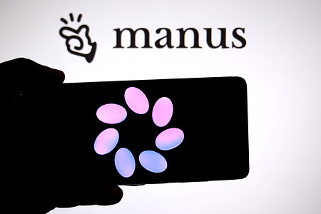 In this photo illustration, a Meta AI logo is seen displayed on a smartphone with a Manus AI logo in the background.