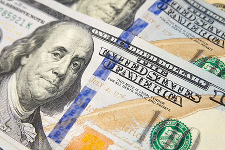 In this photo illustration, a close up view of a one hundred dollar U.S. bill is seen displayed.