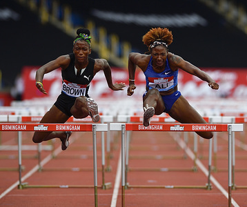 Janeek Brown (Jamaica) and Nia Ali (USA) in action during the IAAF Diamond League Athletics at the Alexander Stadium in Birmingham.