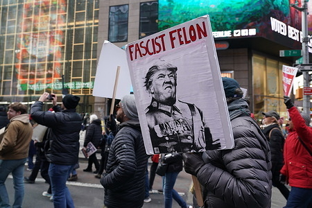 Tens of Thousands of people marched, carrying signs expressing their opinions, from Central Park through TImes Square down to 34th St. at the Third "No Kings" March in New York City.