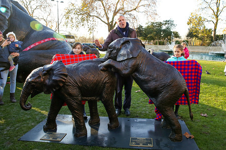 Zac Goldsmith (R), Minister for Environment, Food and Rural Affairs speaks at the unveiling of 21 bronze life-sized elephants sculptured by artists, Gillie and Marc at Marble Arch in London.
The sculptures are to highlight the plight of the species which faces extinction by 2040. The herd of elephants will be on display for one year, until 4 December 2020.